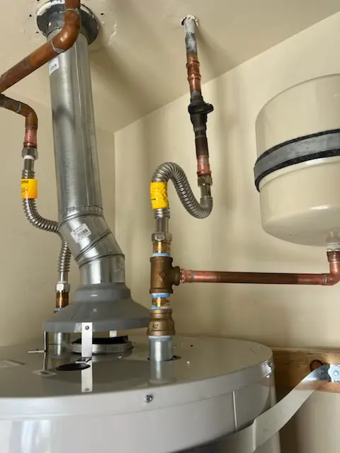 Water heater installation and plumbing repair in Academyville